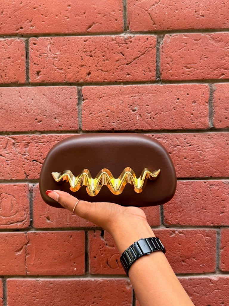 Twisted mini Wesst Clutch