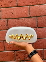 Twisted mini Wesst Clutch