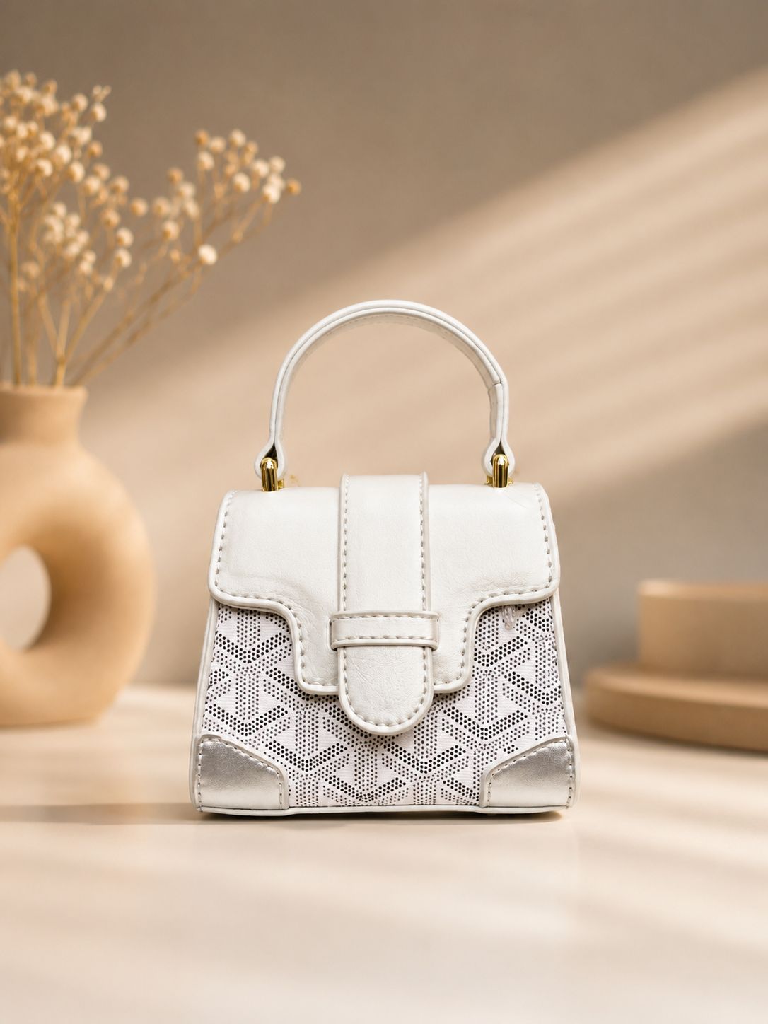 Lily textured mini sling